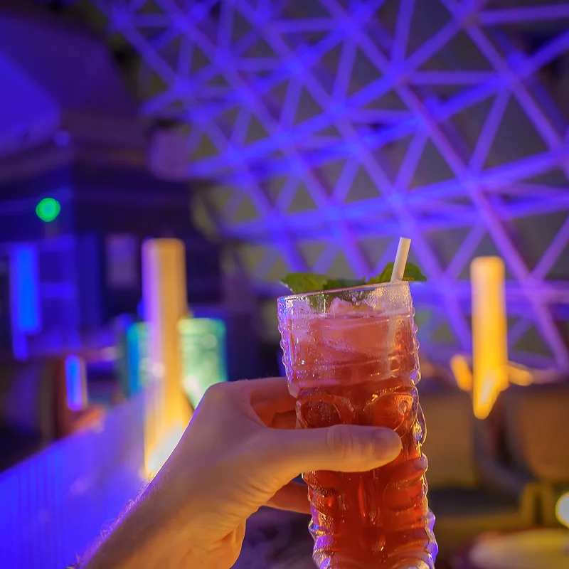 Course lecturer smiling and pointing